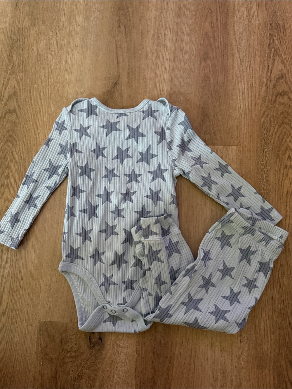 cloud island baby tee in light gray with cloud motif